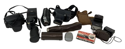 Lot 339 - A quantity of cameras and camera equipment...