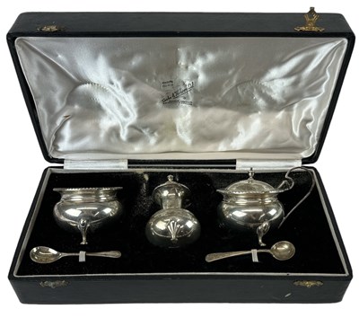 Lot 1130 - COOKE & KELVEY LTD; a cased sterling silver...