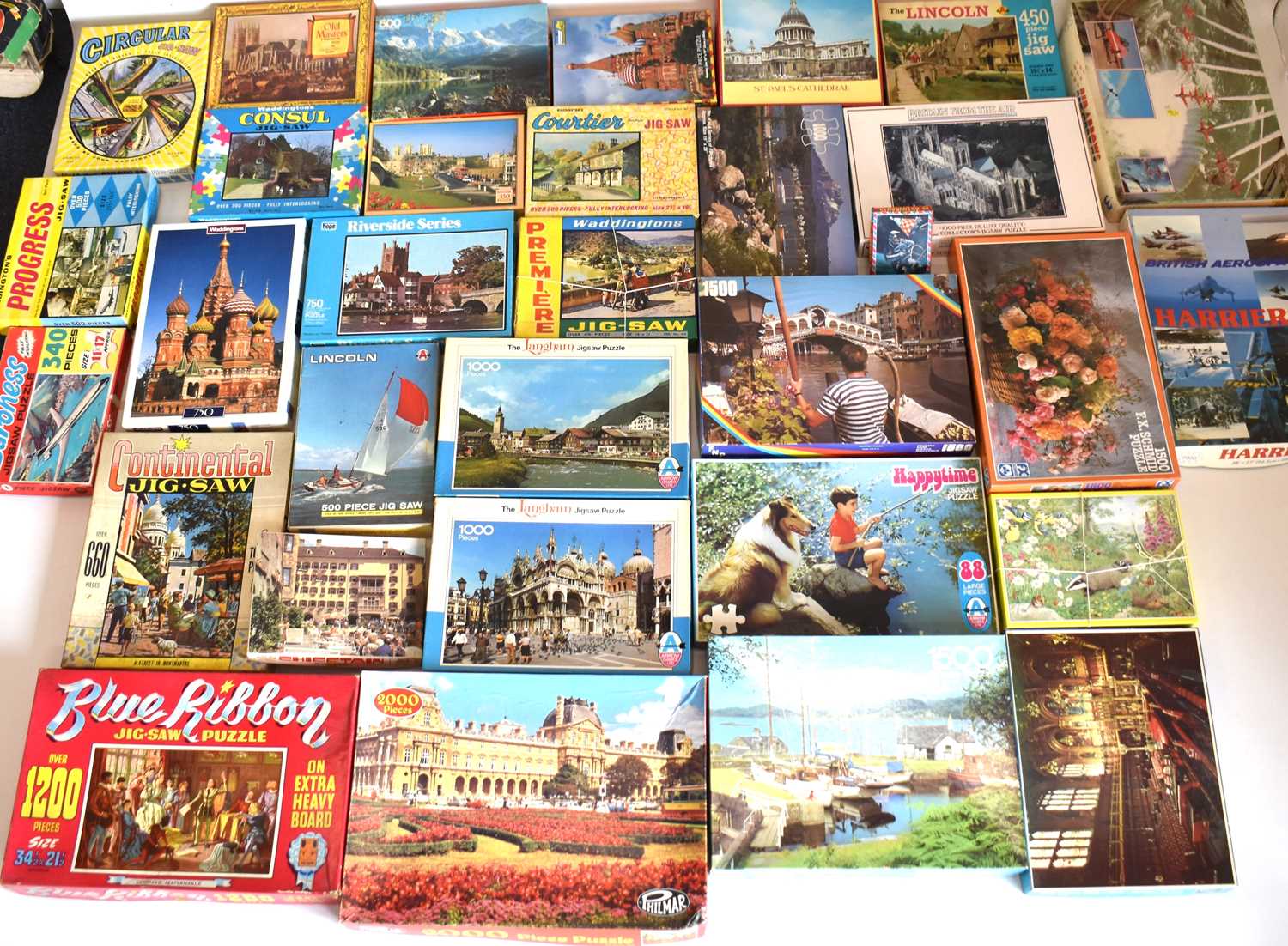 Lot 662 - A large quantity of 1970s/80s jigsaw puzzles,...