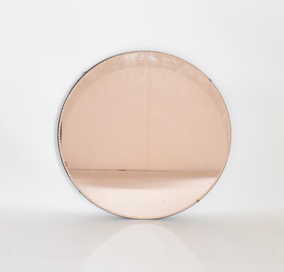 Lot 71 - A vintage copper tone circular wall mirror...