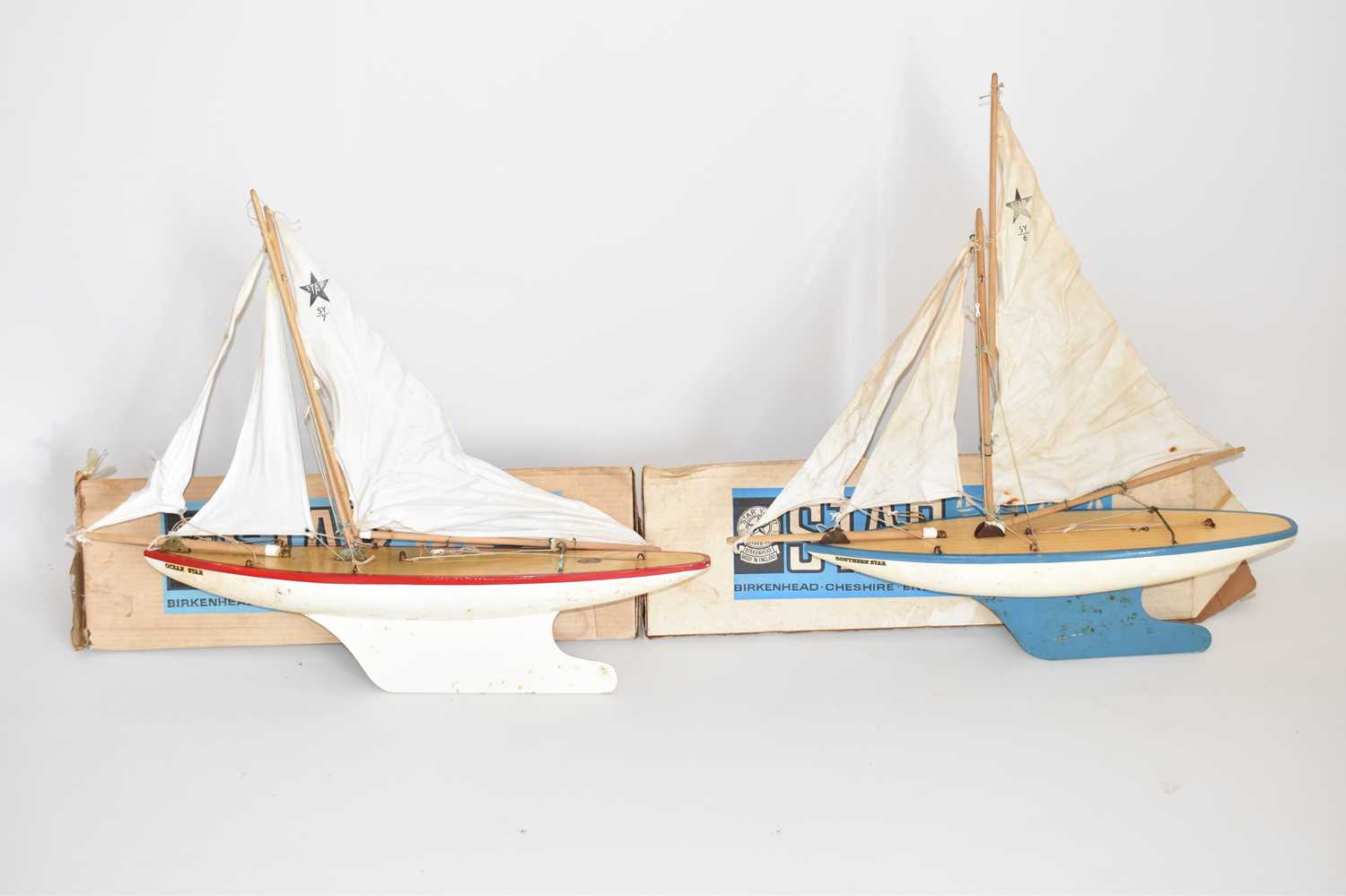 Lot 657 - Two Star pond yachts, one with blue and white...