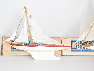 Lot 657 - Two Star pond yachts, one with blue and white...