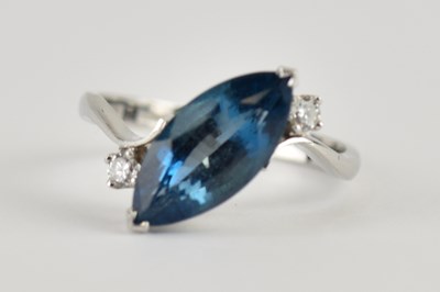 Lot 1004 - An 18ct white gold ring set with marquise cut...