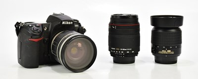 Lot 401 - NIKON; a Nikon D300 DSLR camera, together with...