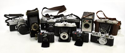 Lot 524 - A collection of film cameras, to include a...