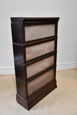 Lot 1171 - A Globe-Wernicke oak four section bookcase,...