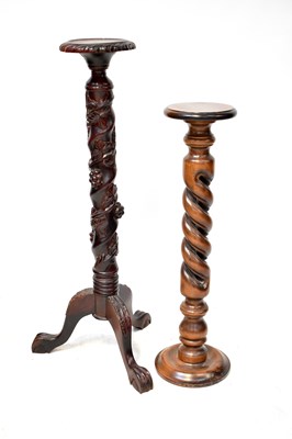 Lot 70 - Two modern mahogany plant stands in the antique style