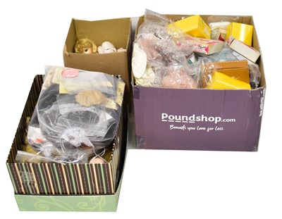 Lot 745 - A large quantity of dolls' wigs, to include...