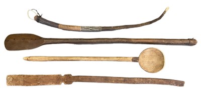 Lot 1069 - A large African spoon, two stirring sticks and...