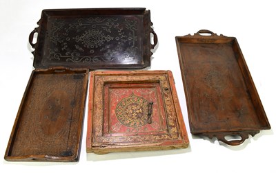 Lot 23 - Three Indian hardwood trays and a painted...