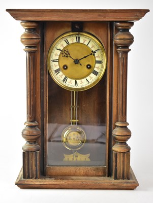 Lot 97 - An early 20th century wall clock, the chapter...