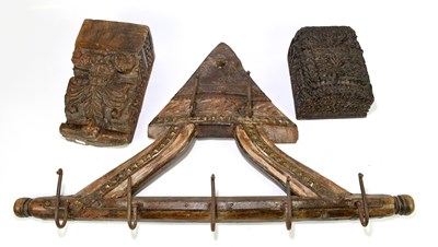 Lot 103 - Two carved corbels, together with a coat rack...