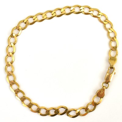 Lot 1043 - A 9ct gold flat curb link bracelet, length...