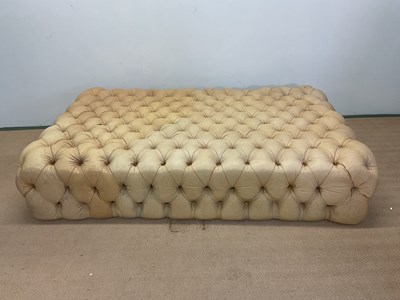 Lot 712 - A contemporary buttoned leather ottoman,...