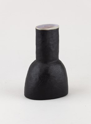 Lot 607 - SUSAN DISLEY; a stoneware bottle form covered...