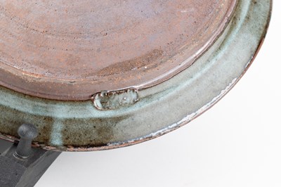 Lot 429 - Abuja Pottery; a stoneware plate covered in...