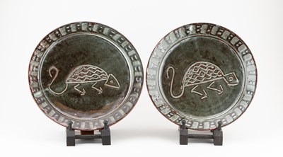 Lot 427 - Abuja Pottery; a near pair of stoneware plates...