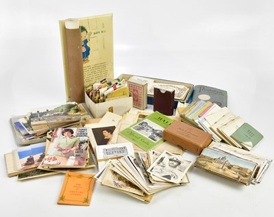 Lot 638 - A miscellany of postcards, cigarette cards,...