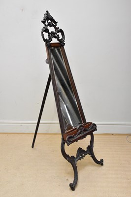 Lot 1223 - A carved walnut Rococo style easel with...