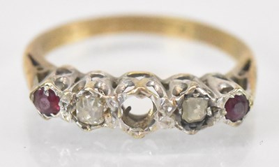 Lot 1367 - A 9ct yellow gold diamond and ruby set ring...