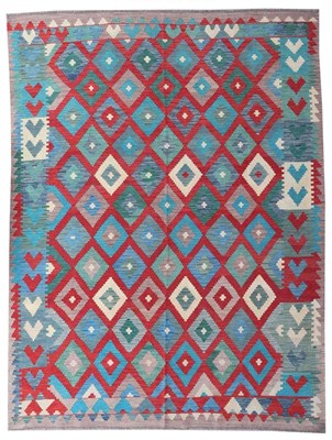 Lot 80 - An Afghan Chobi hand woven woollen kilim rug,...