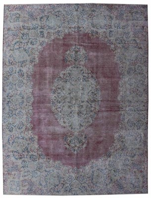 Lot 72 - A large Persian Kerman hand knotted woollen...