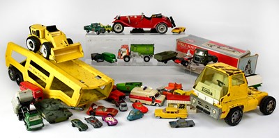 Lot 310 - A quantity of playworn toys including a Tonka...