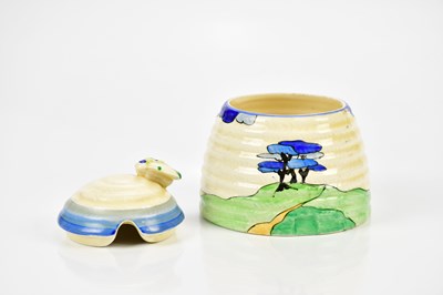 Lot 2212 - CLARICE CLIFF; a Bizarre Beehive honeypot and...