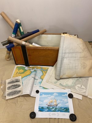 Lot 24 - A chest containing ship's charts, pictures of...