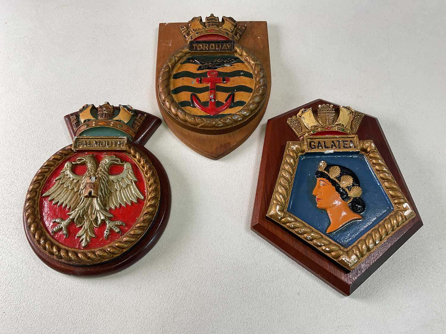 Lot 35 - Three naval plaques; HMS Torquay H; 21cm, HMS...