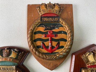 Lot 35 - Three naval plaques; HMS Torquay H; 21cm, HMS...