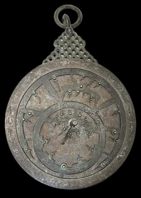 Lot 326 - A Persian bronze astrolabe, diameter 15.5cm.