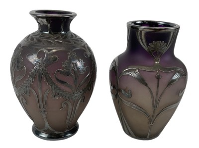 Lot 670 - Two Art Nouveau frosted glass vases with white...