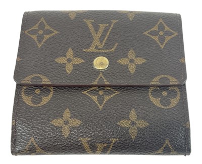 Lot 514 - LOUIS VUITTON; a brown leather Monogram...