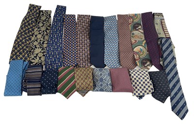 Lot 523 - A group of approximately twenty-four silk ties,...