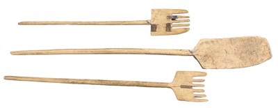 Lot 382 - Three primitive wooden implements, the largest...