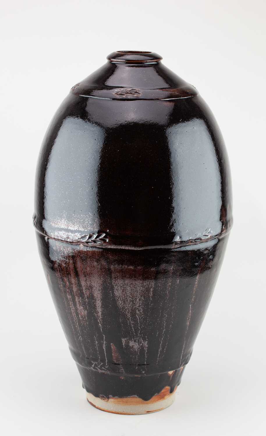 Lot 411 - MARK GRIFFITHS (born 1956); a very tall...