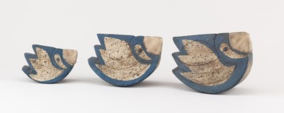 Lot 676 - A graduated trio of rocking stoneware bird...