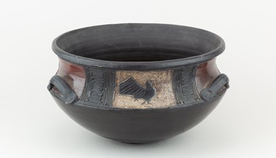 Lot 310 - JOHN BEDDING (born 1947); an angular raku bowl...