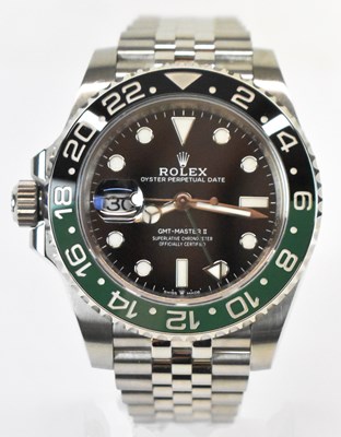 Lot 1433 - ROLEX; a stainless steel GMT-Master II left...