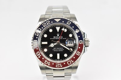 Lot 1435 - ROLEX; a stainless steel GMT-Master II...