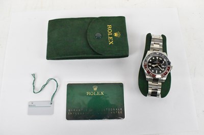 Lot 1435 - ROLEX; a stainless steel GMT-Master II...