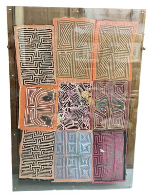 Lot 558 - A large African tapa cloth, in clear acrylic...