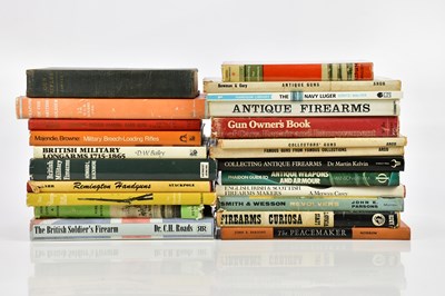 Lot 1228 - A collection of books on firearms and gun...