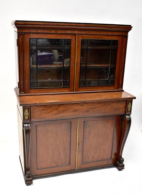 Lot 26 - An Edwardian mahogany bureau bookcase of small proportions