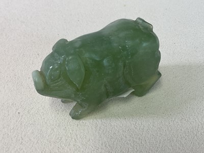 Lot 140 - A Chinese carved jade figure of a pig, length...