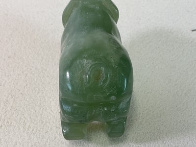 Lot 267 - A Chinese carved jade figure of a pig, length...