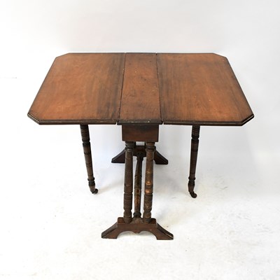 Lot 60 - An Edwardian mahogany Sutherland table of...