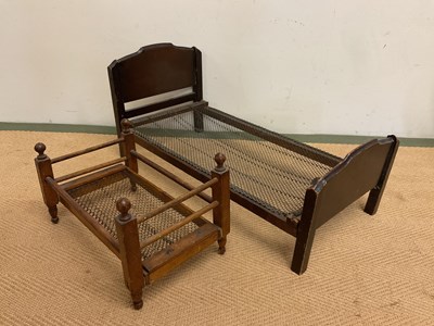 Lot 232 - A collection of doll's furniture including a...