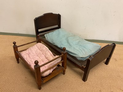 Lot 232 - A collection of doll's furniture including a...